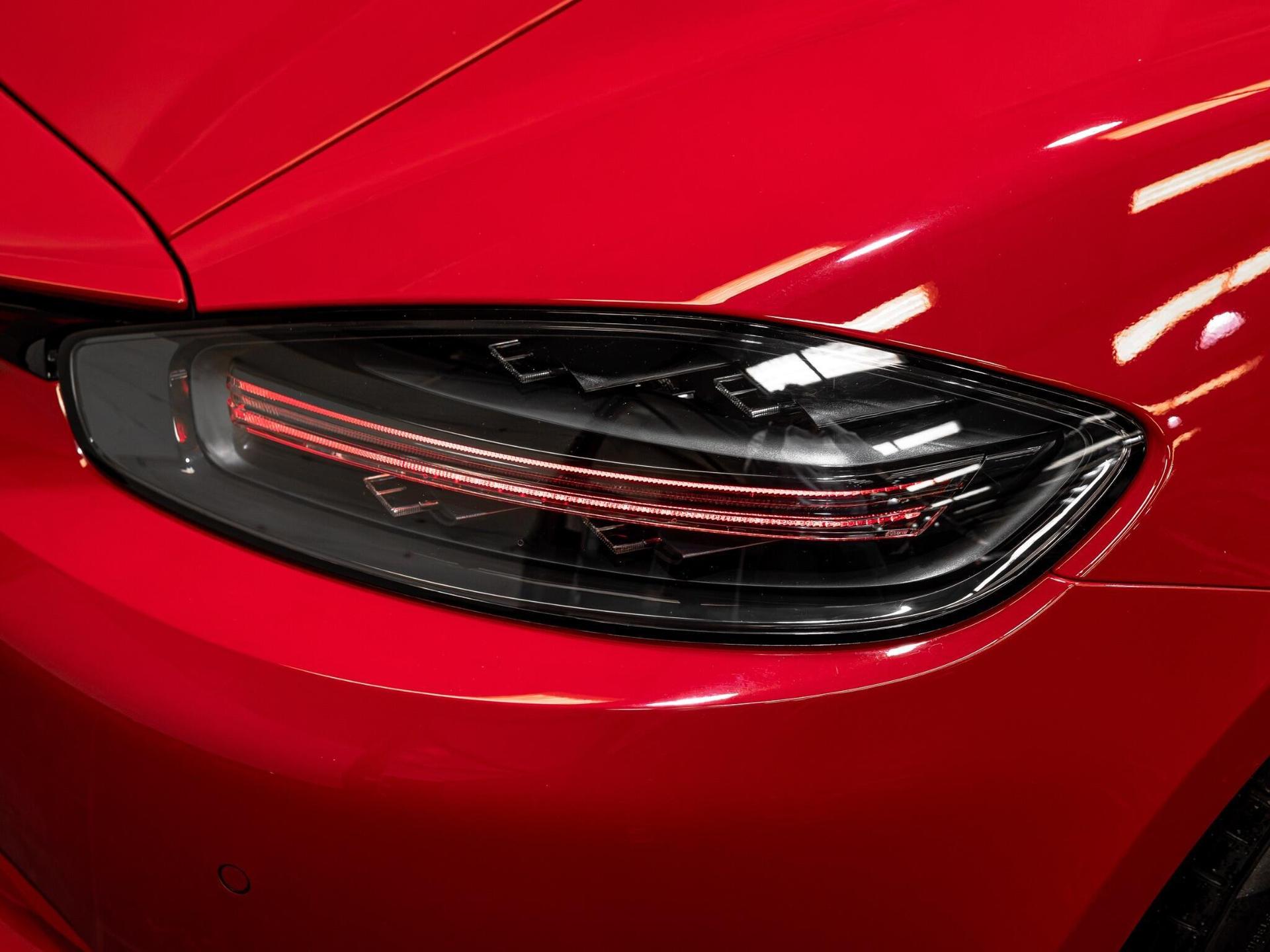 An exterior shot of the lights front on a 2021 Porsche 718 Cayman