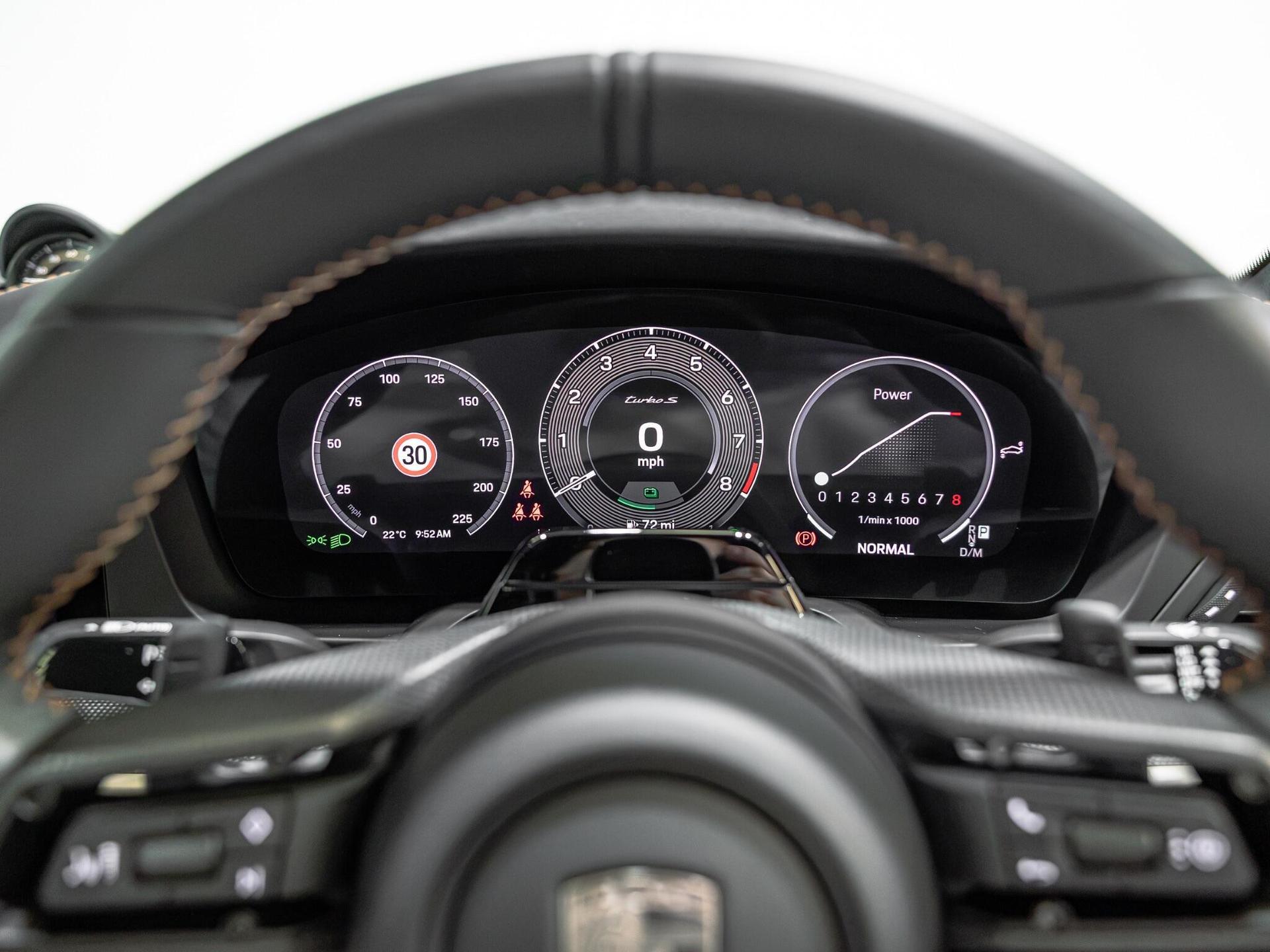 An interior shot of the driver instruments on a 2026 Porsche 911