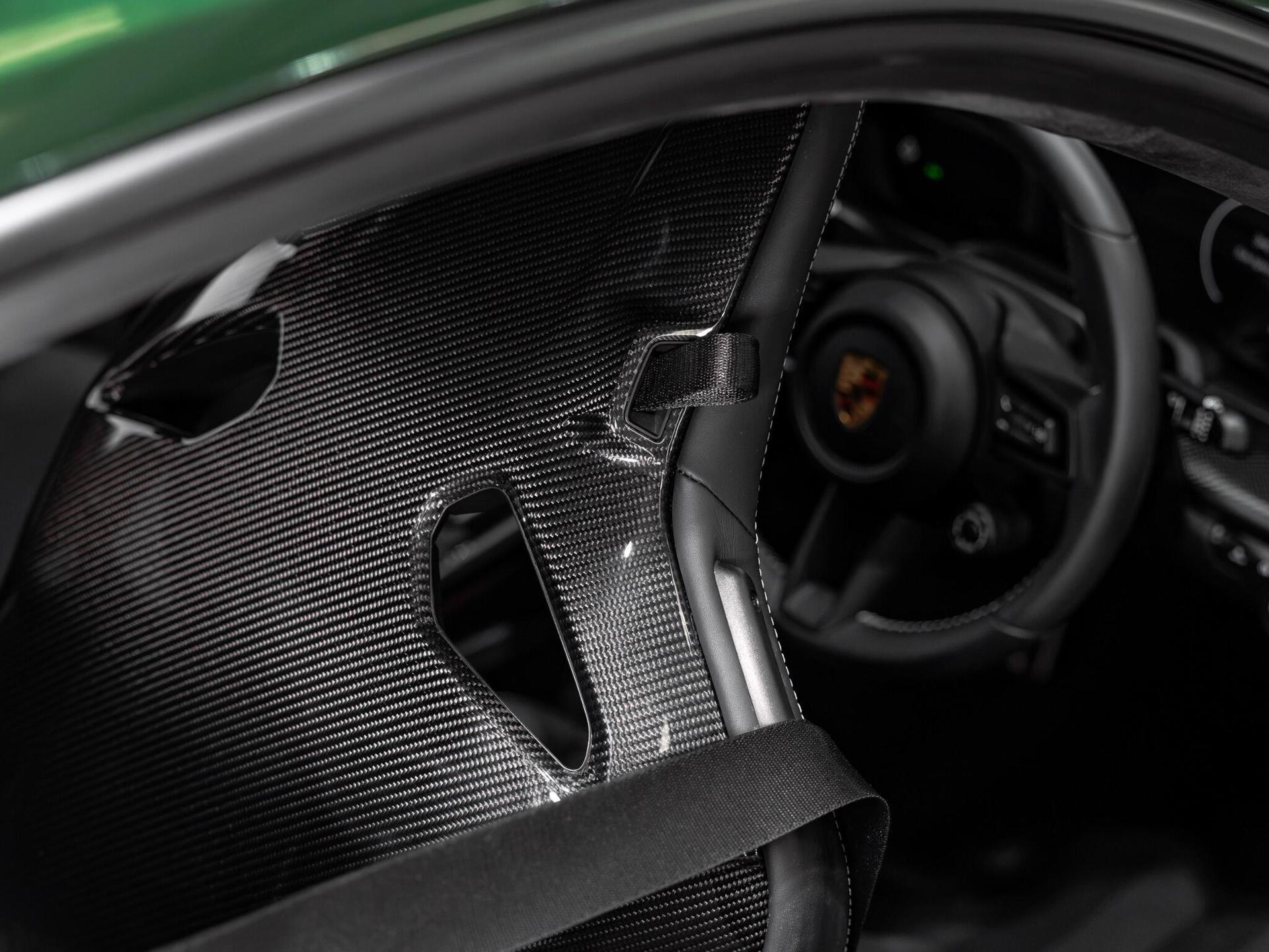 An interior shot of the steering wheel on a 2025 Porsche 911