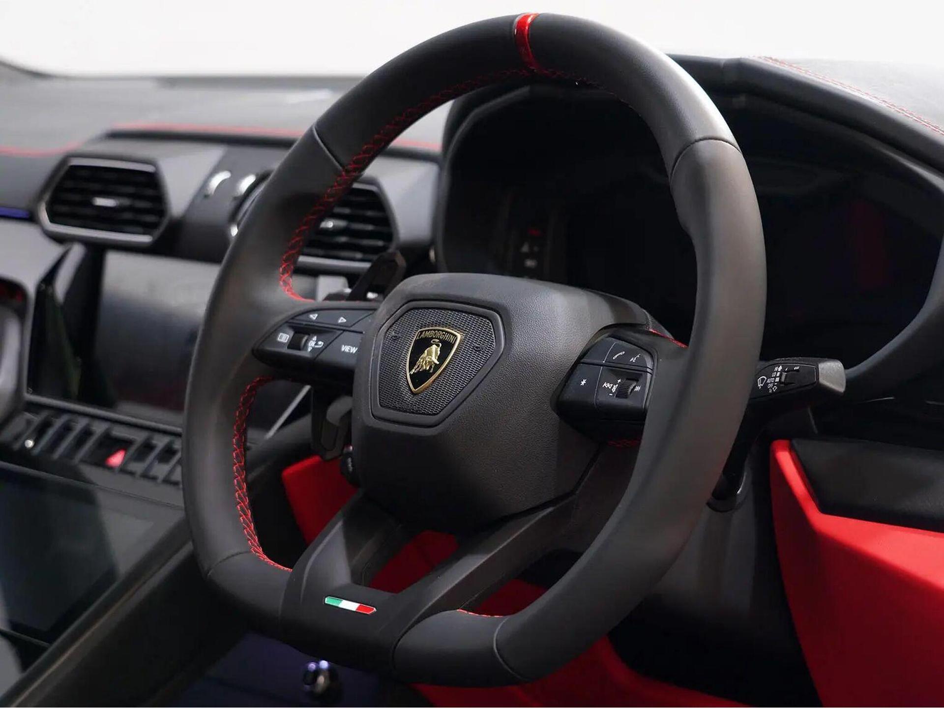 An interior shot of the steering wheel on a 2023 Lamborghini Urus