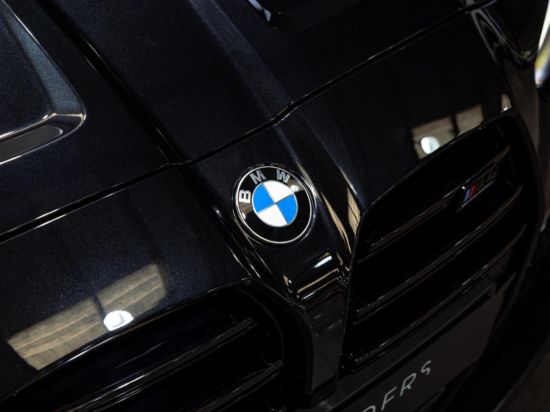 An exterior shot of the badge exterior on a 2025 BMW M4