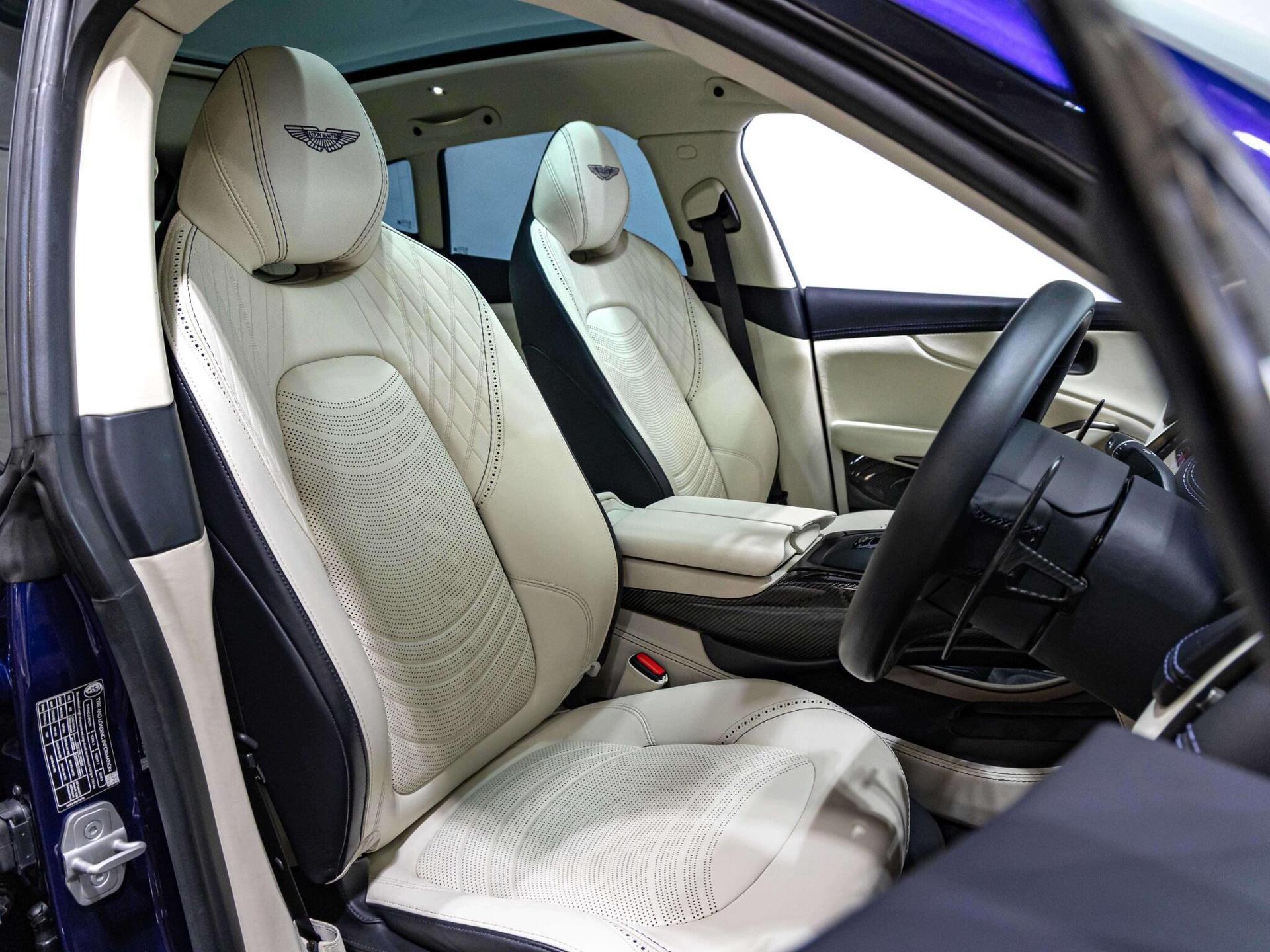 An interior shot of the driver seat on a 2023 Aston Martin DBX