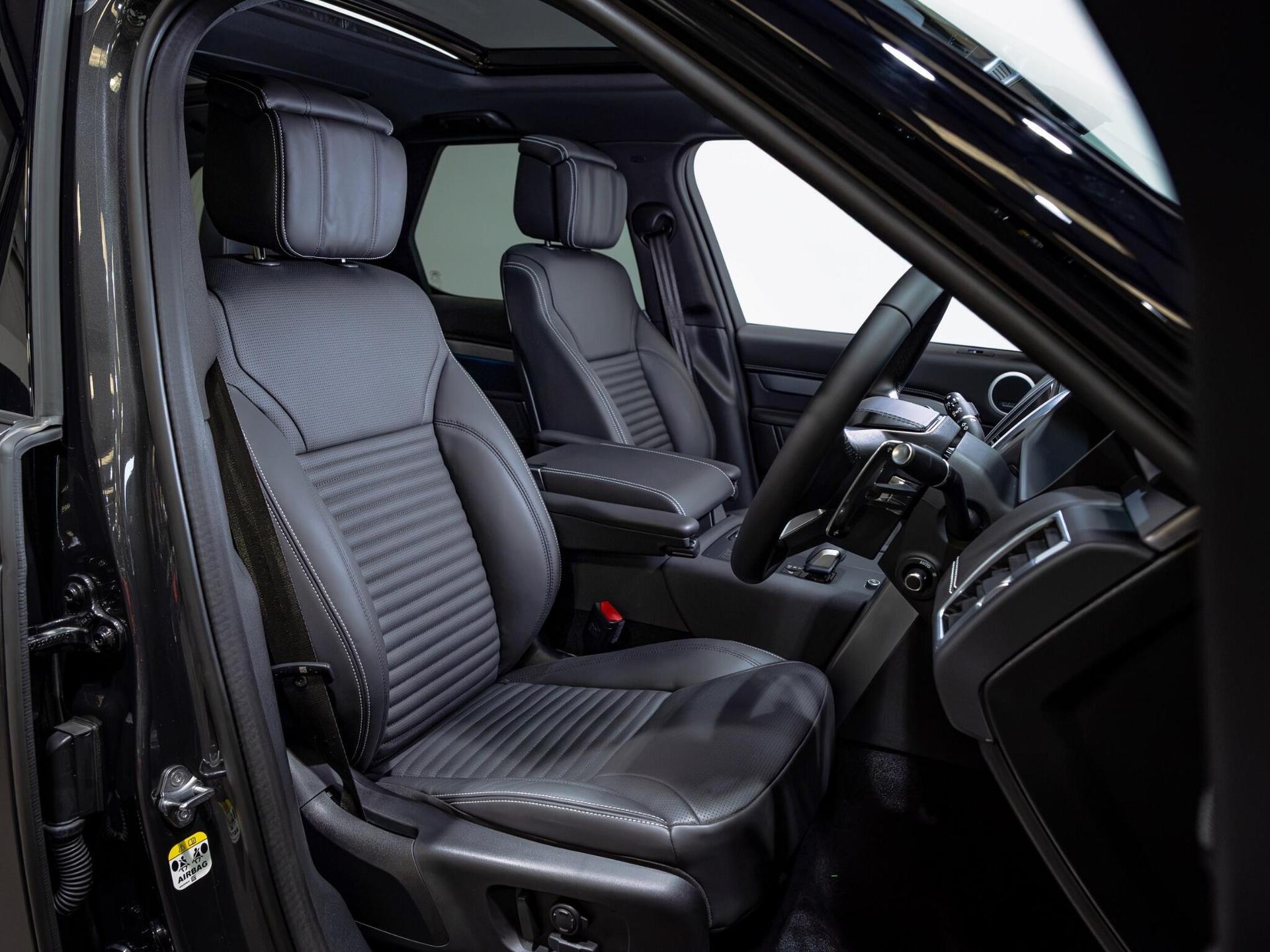 An interior shot of the driver seat on a 2026 Land Rover Discovery