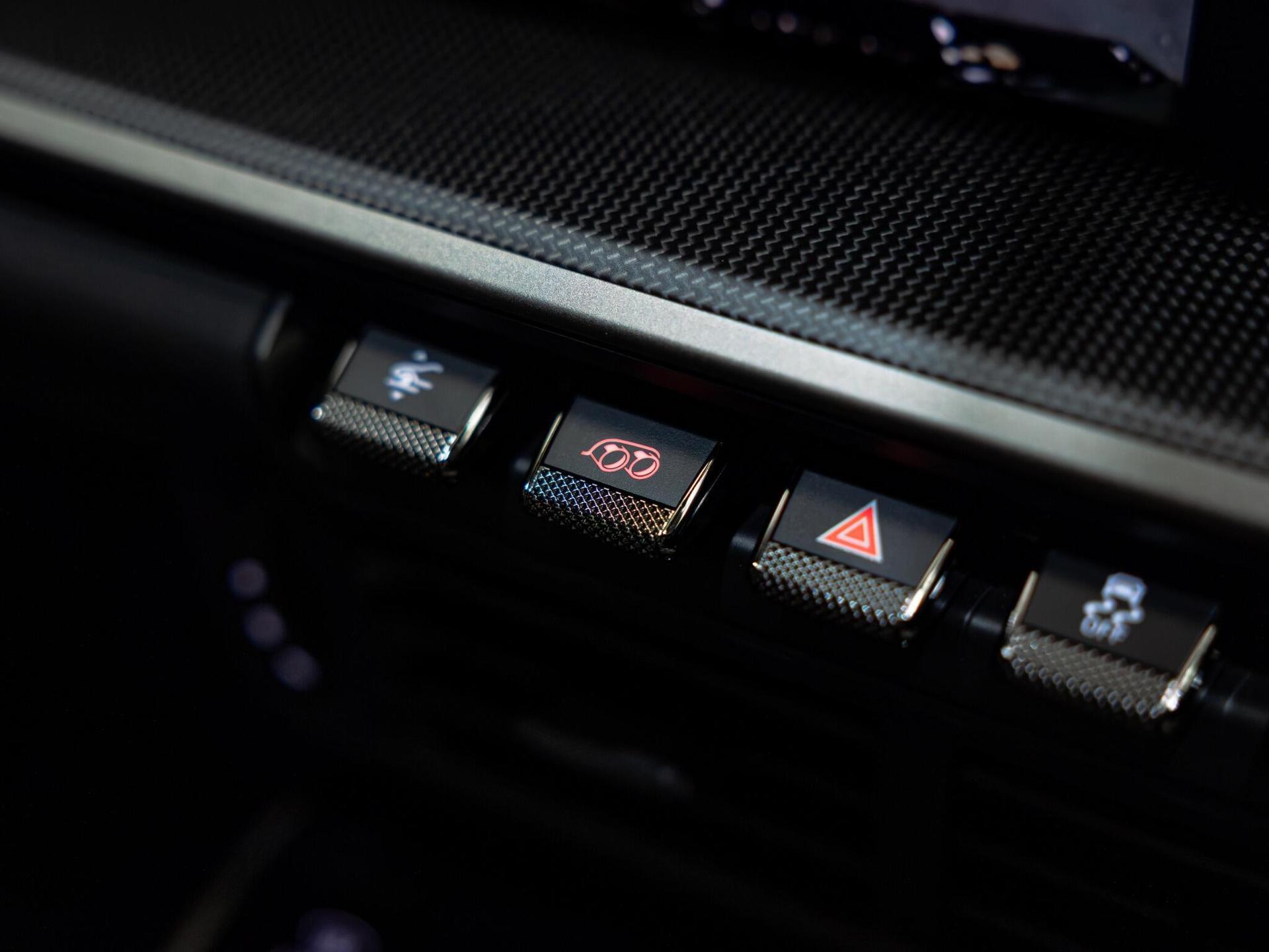 An interior shot of the misc controls on a 2026 Porsche 911