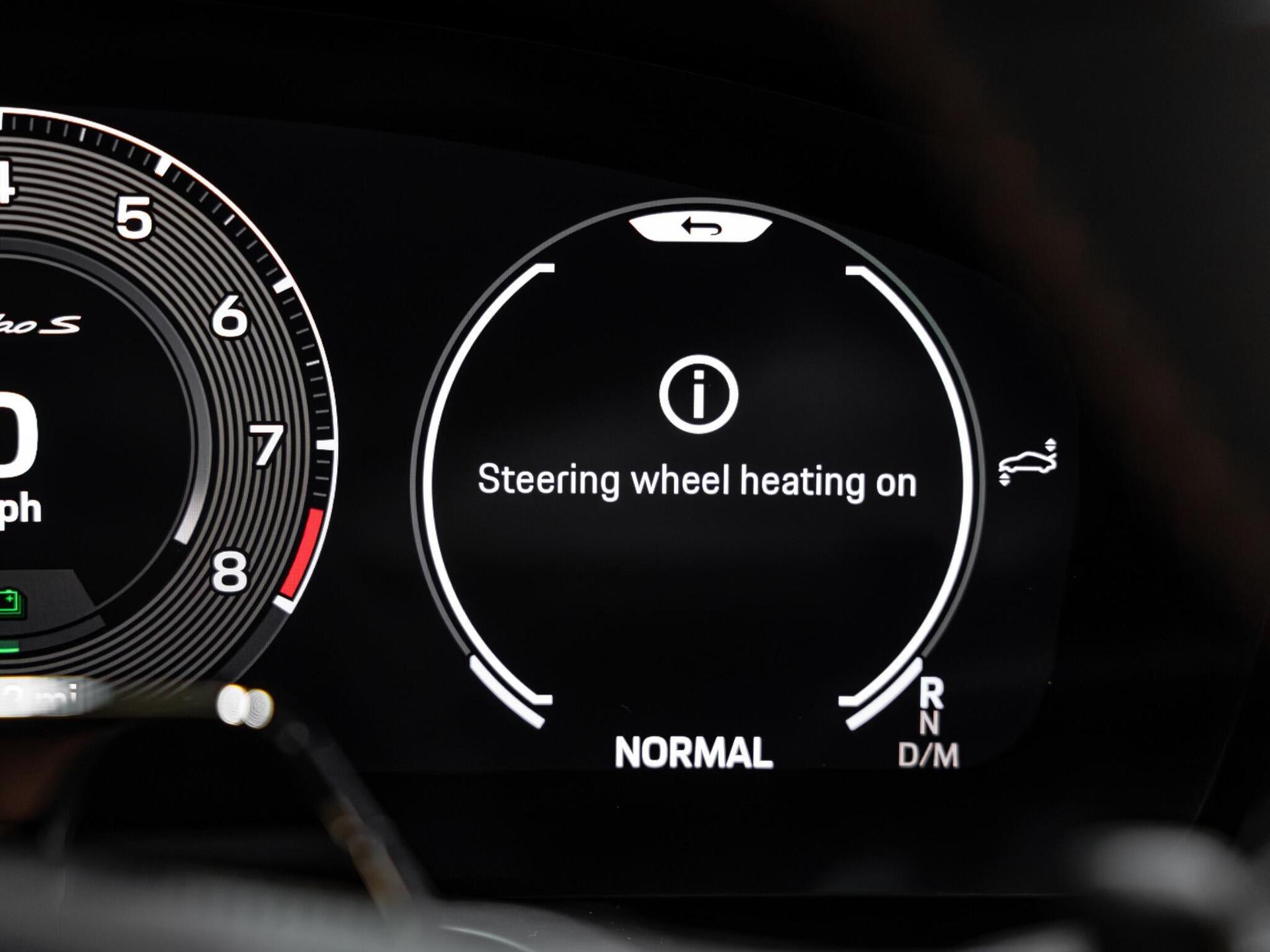 An interior shot of the driver instruments on a 2026 Porsche 911