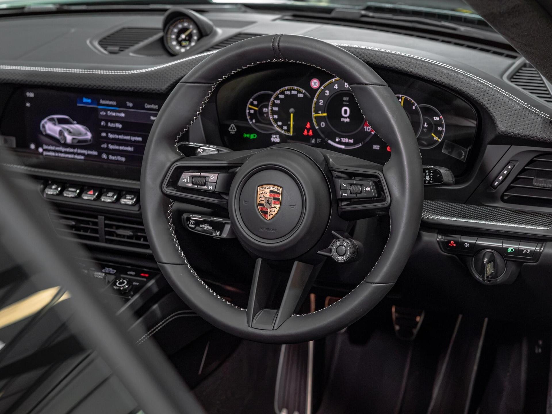 An interior shot of the steering wheel on a 2025 Porsche 911
