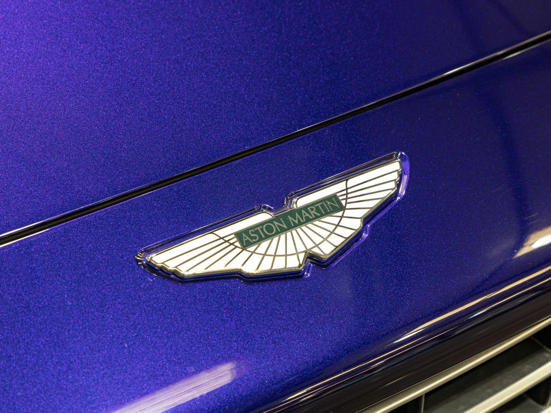 An exterior shot of the badge exterior on a 2023 Aston Martin DBX