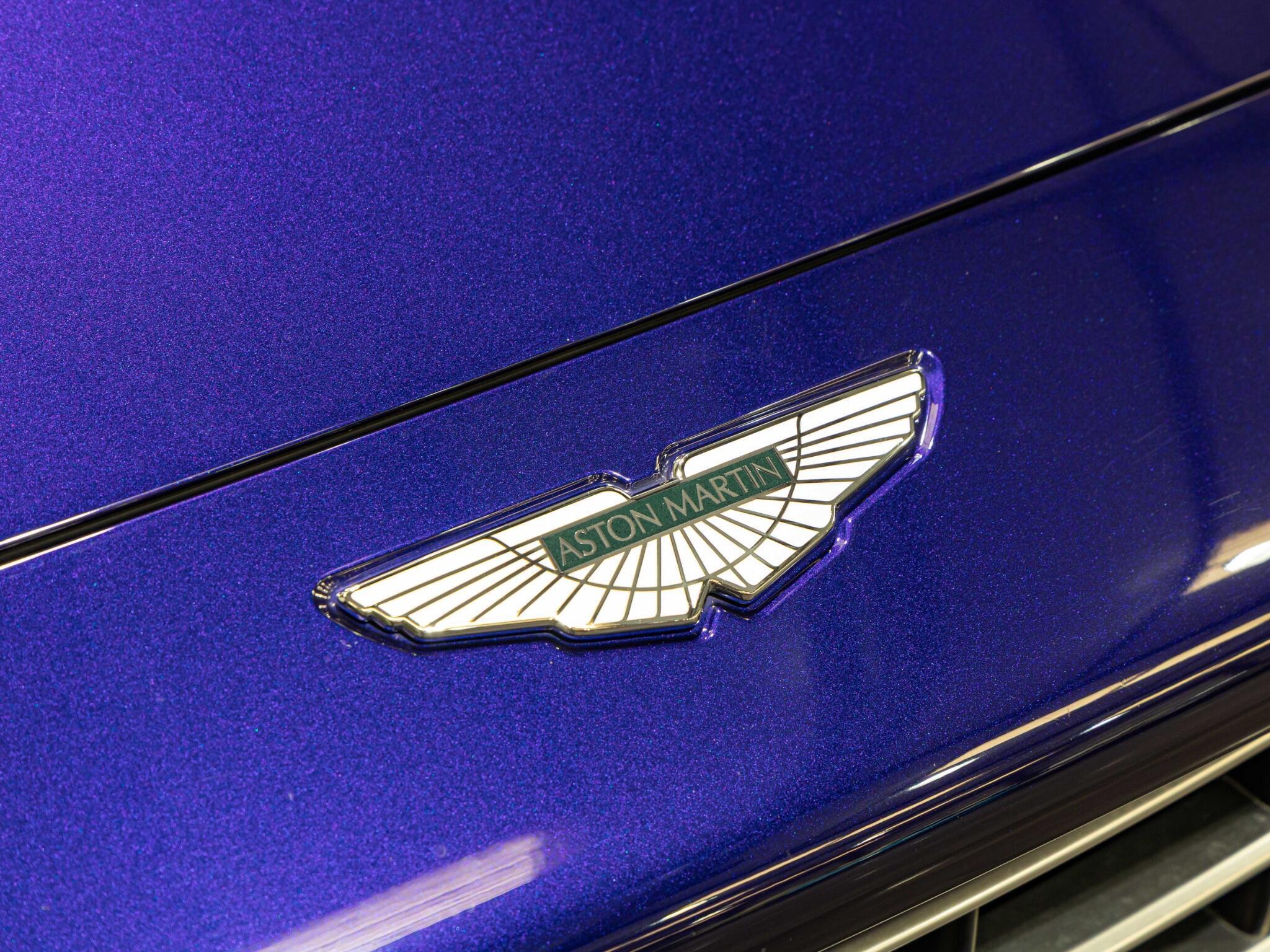 An exterior shot of the badge exterior on a 2023 Aston Martin DBX