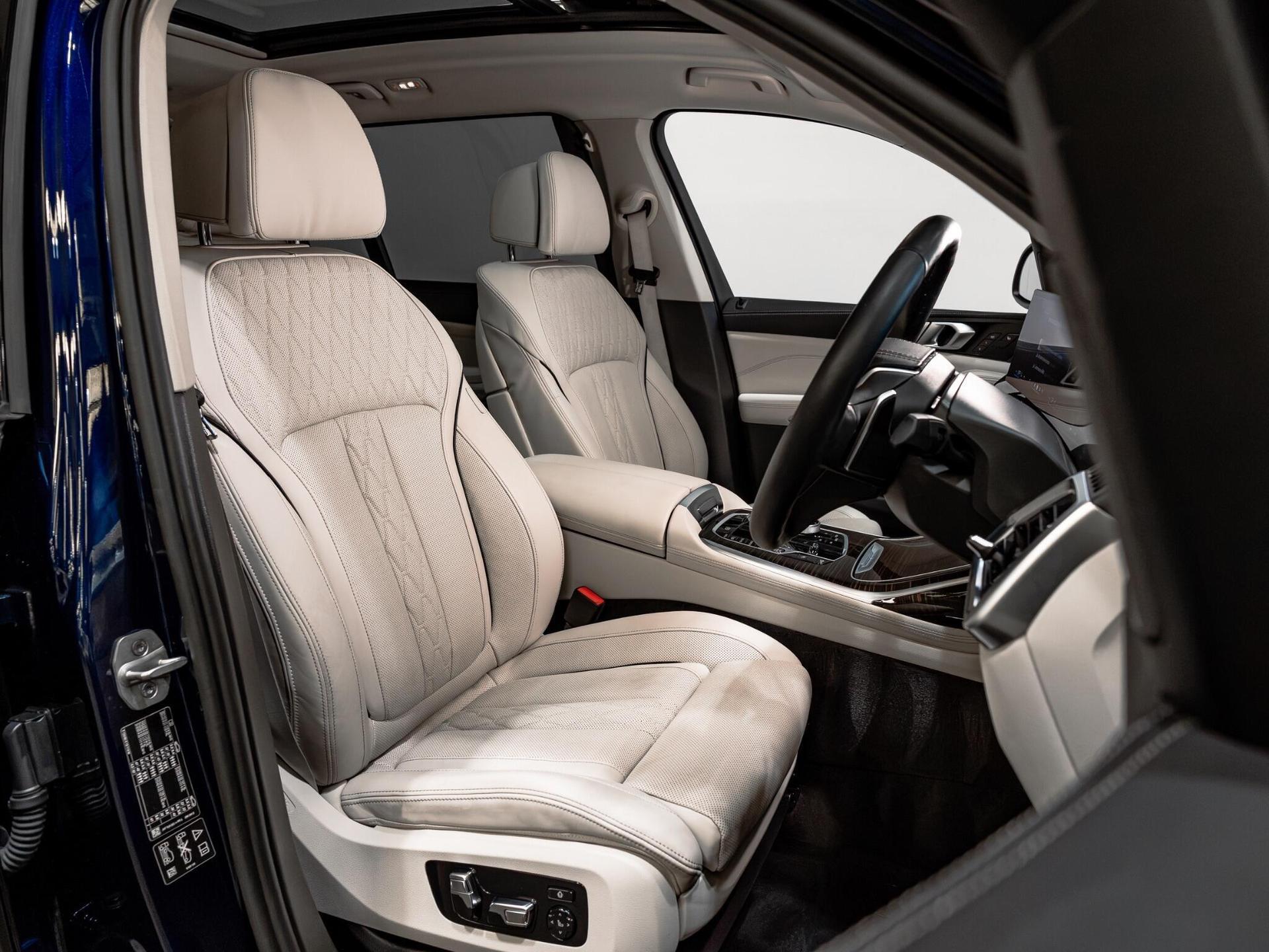 An interior shot of the driver seat on a 2024 BMW X7