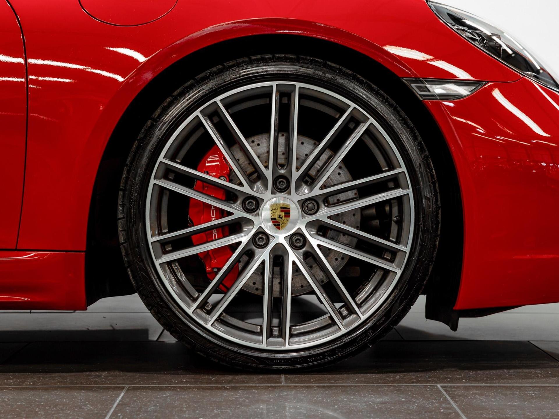 An exterior shot of the wheel on a 2021 Porsche 718 Cayman