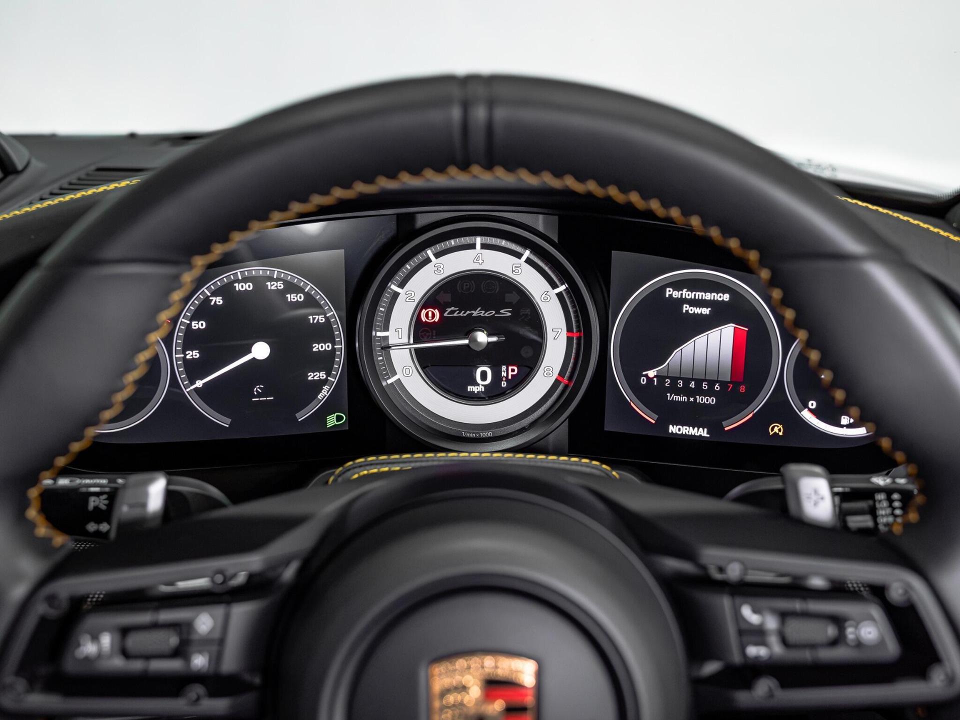 An interior shot of the driver instruments on a 2022 Porsche 911