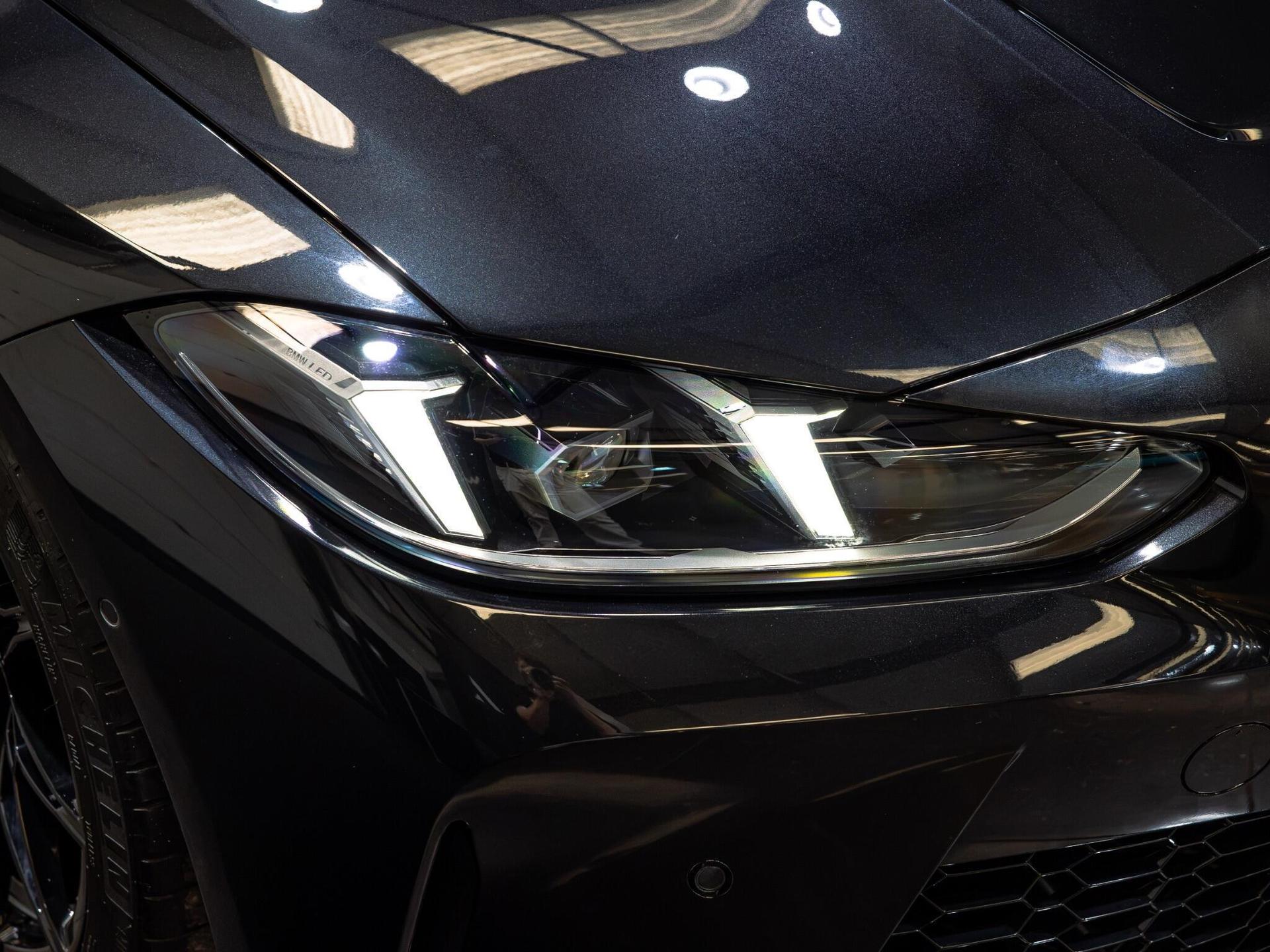 An exterior shot of the lights front on a 2025 BMW M4