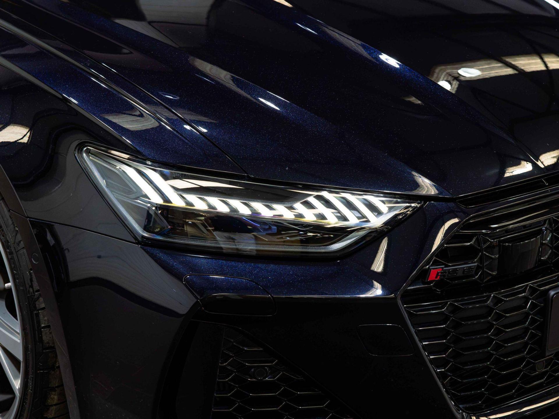 An exterior shot of the lights front on a 2023 Audi RS6 Avant