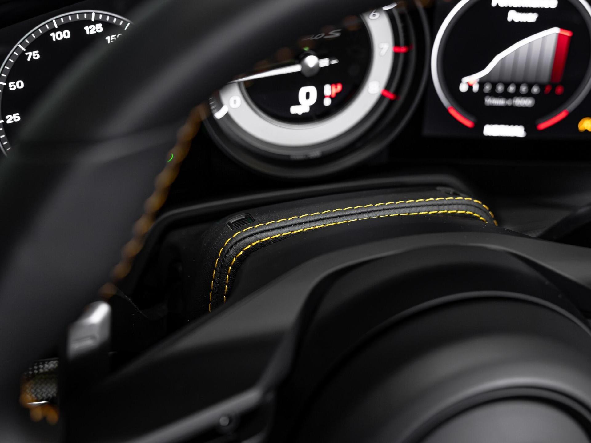 An interior shot of the misc controls on a 2022 Porsche 911