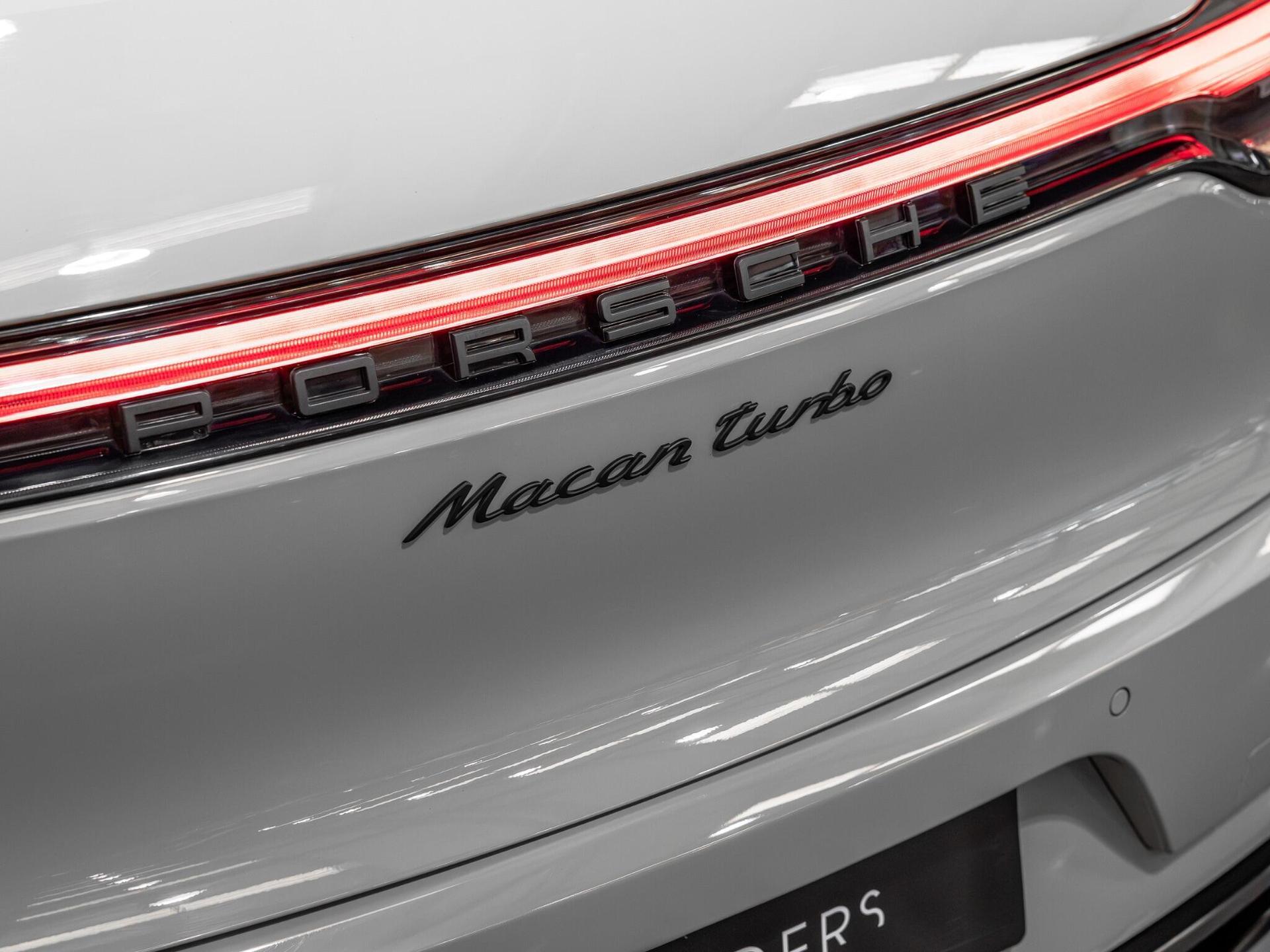 An exterior shot of the badge exterior on a 2020 Porsche Macan