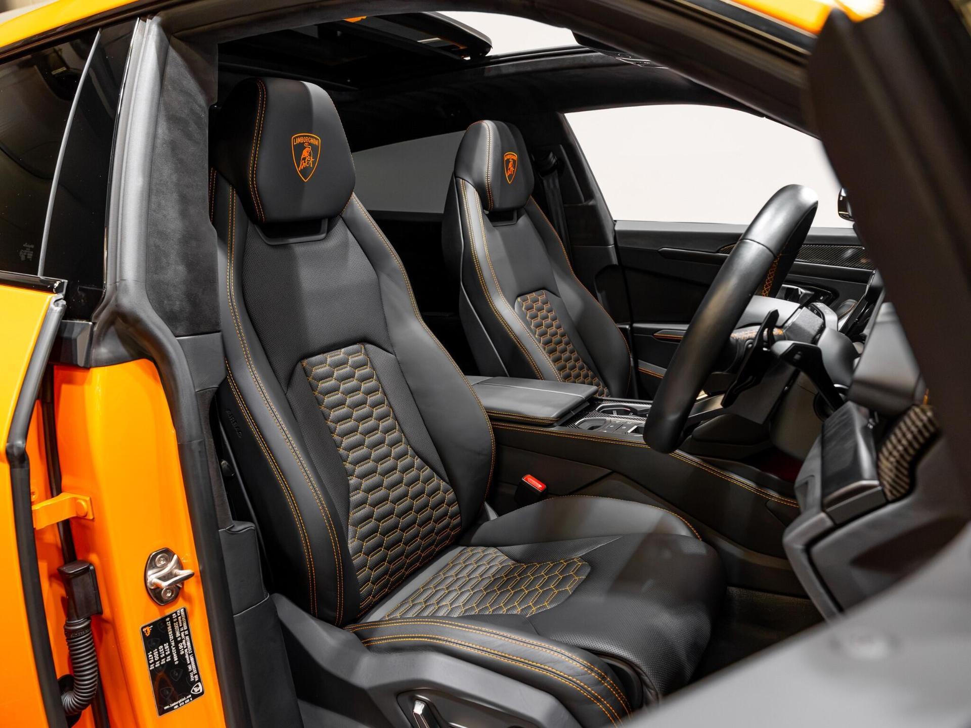 An interior shot of the driver seat on a 2023 Lamborghini Urus