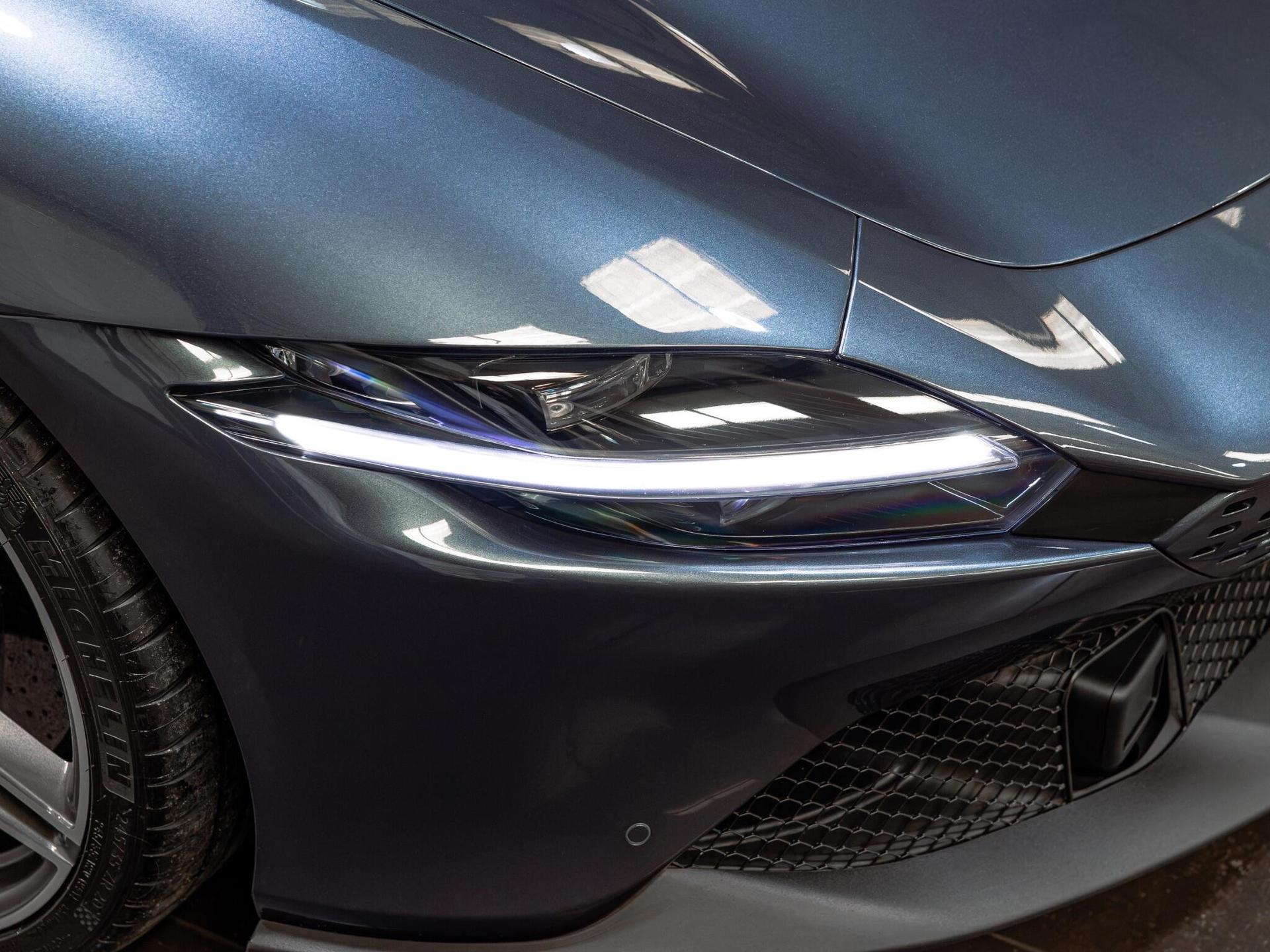 An exterior shot of the lights front on a 2022 Ferrari Roma