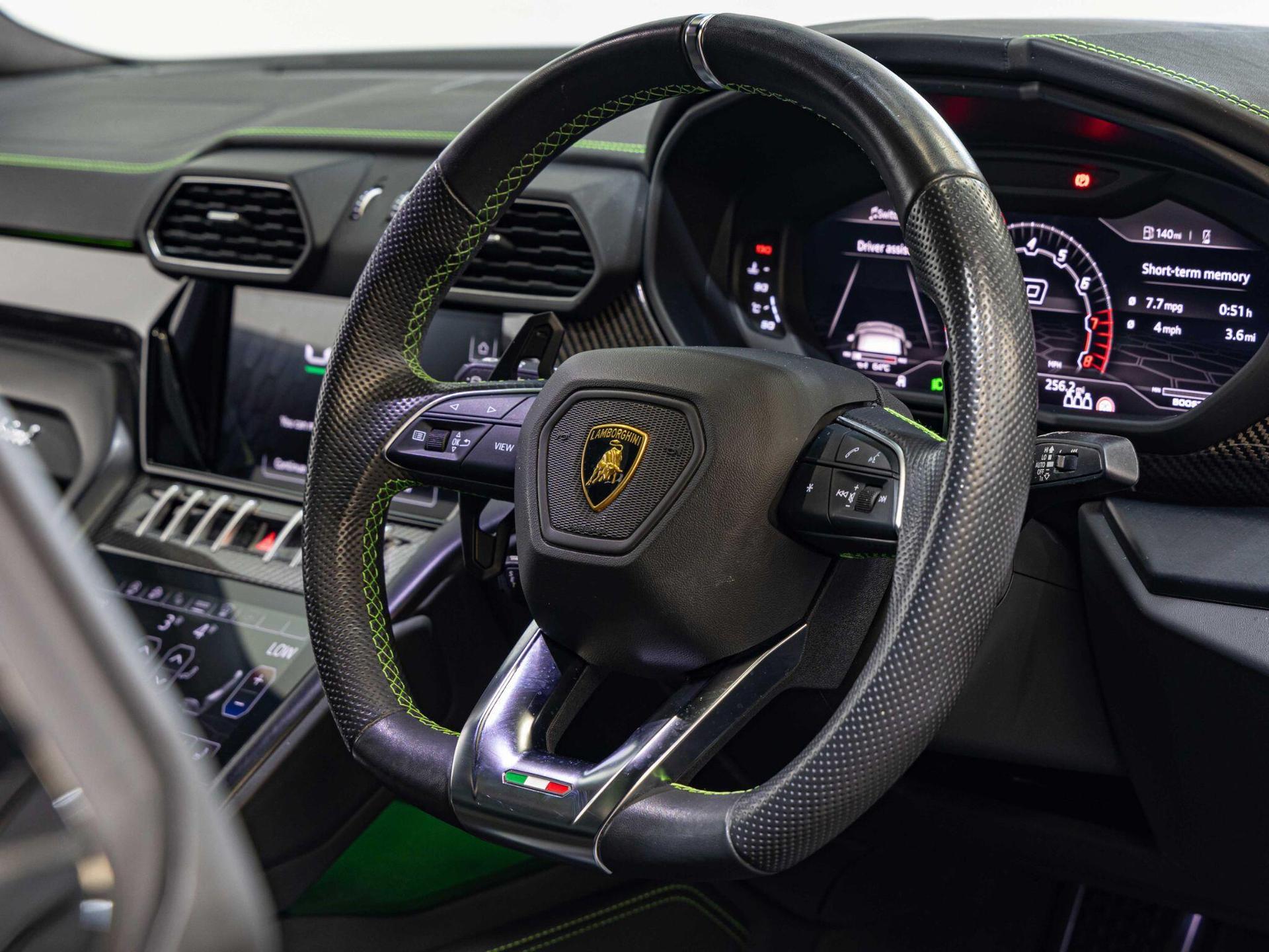 An interior shot of the steering wheel on a 2022 Lamborghini Urus