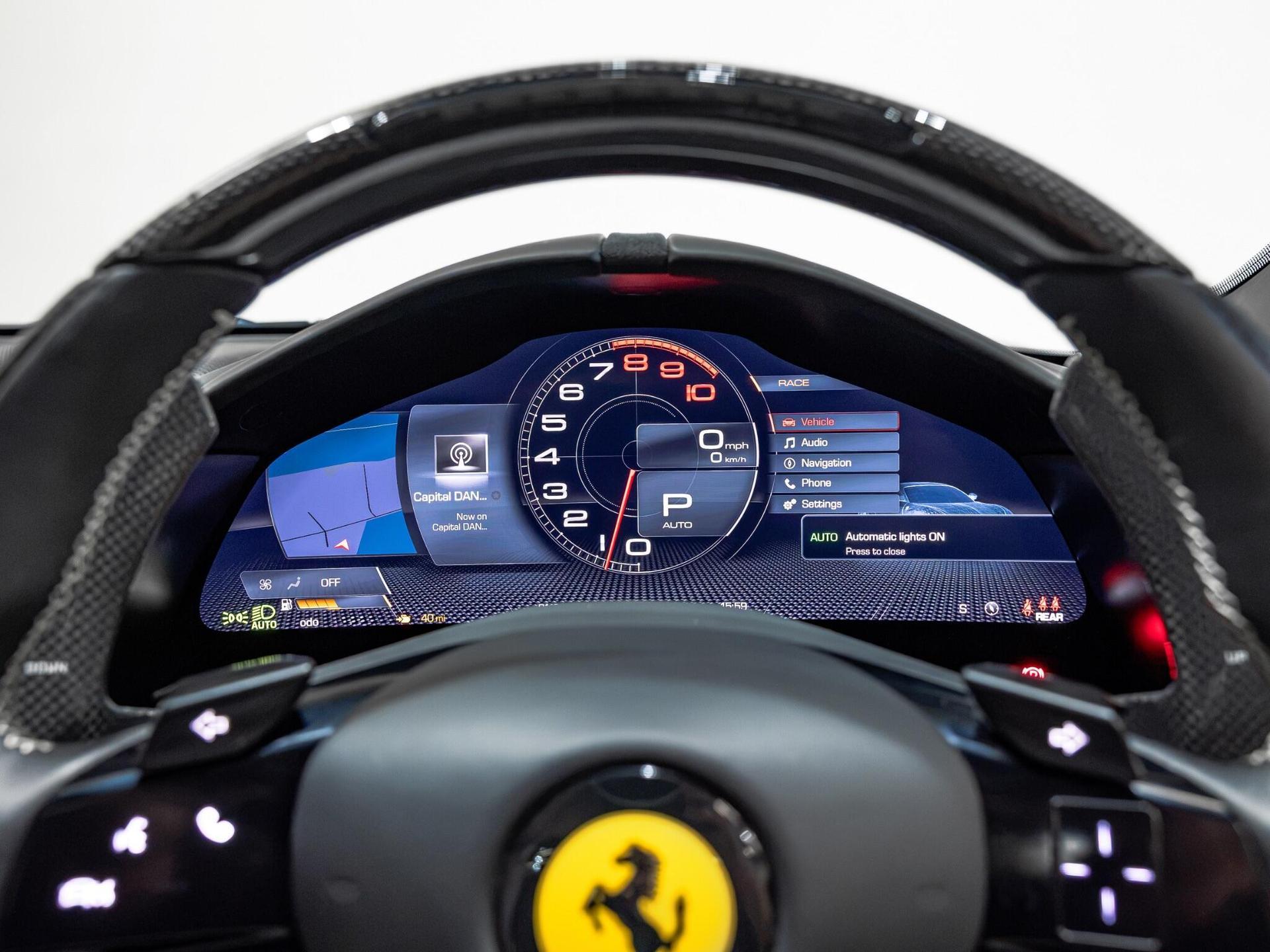 An interior shot of the driver instruments on a 2022 Ferrari Roma