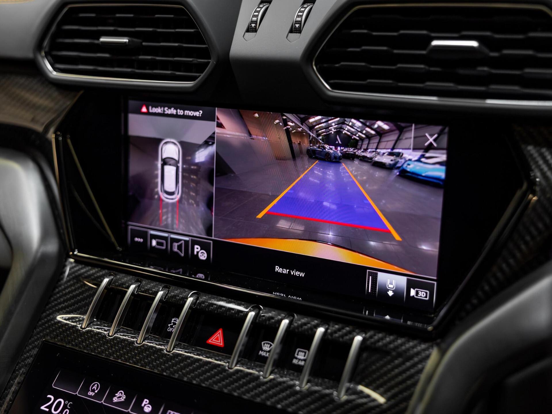 An interior shot of the infotainment system on a 2023 Lamborghini Urus