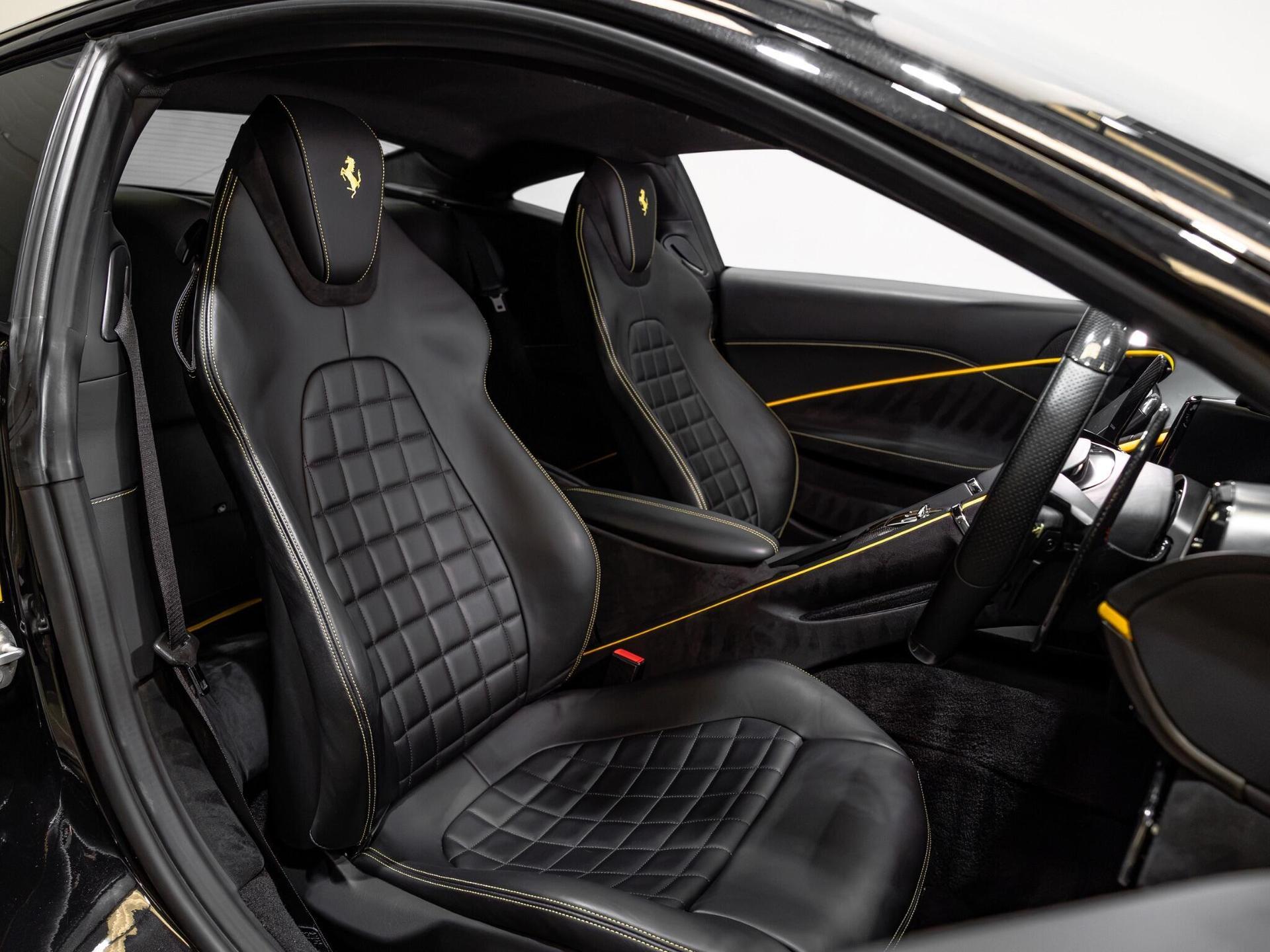 An interior shot of the driver seat on a 2021 Ferrari Roma